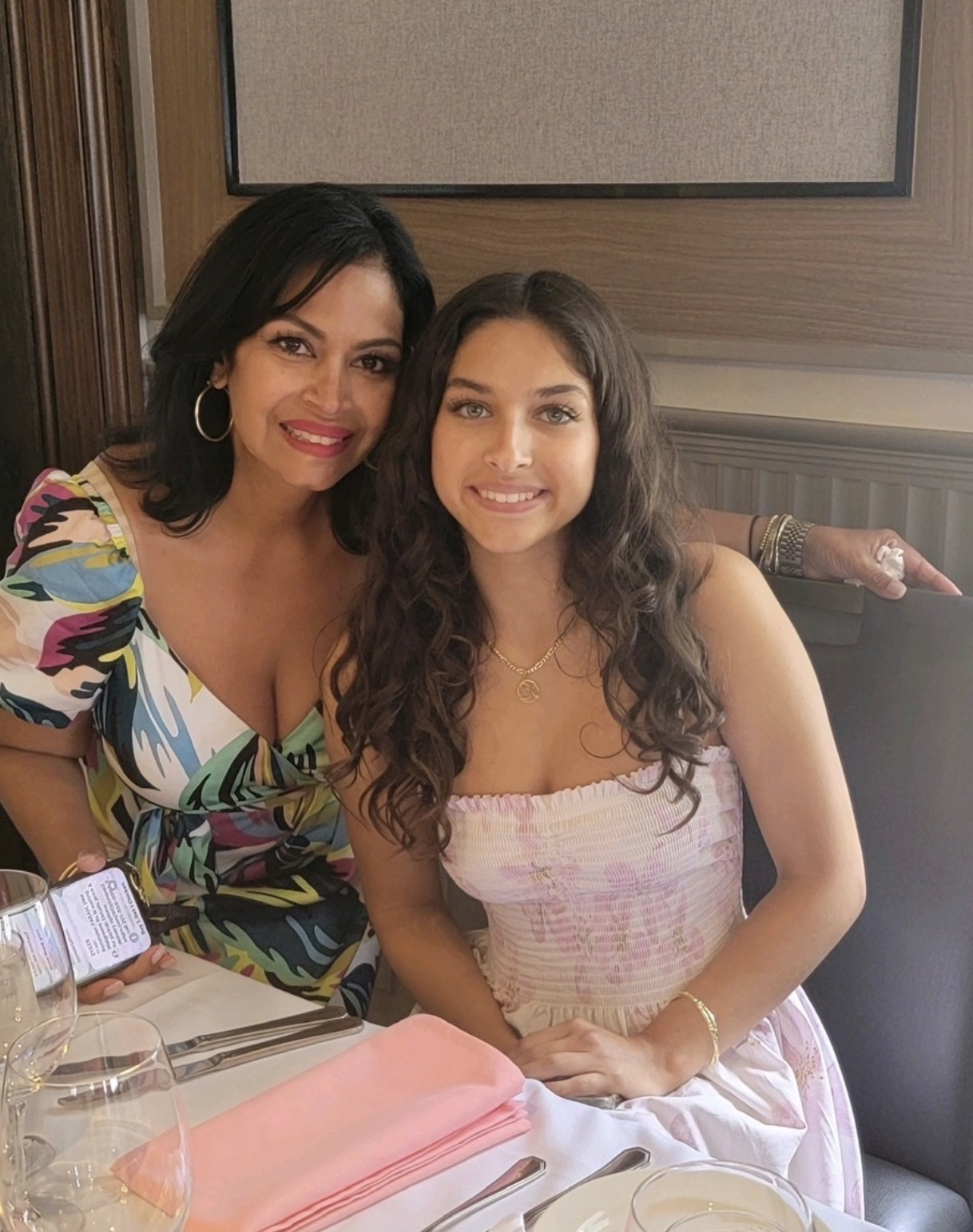 Farah and her daughter Ava today, smiling together at a restaurant table